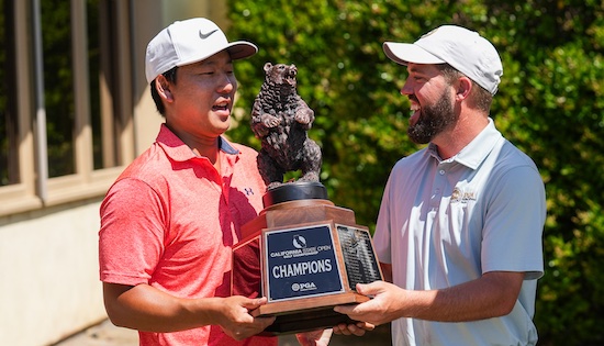 Rak Cho (left) collected a trophy and more than $10,000 for his win